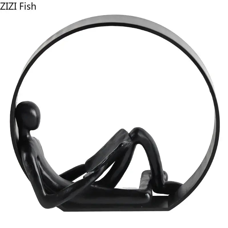 Black Resin Reading Figurine