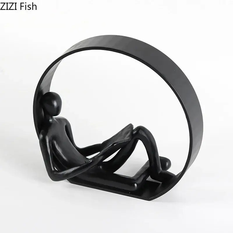 Black Resin Reading Figurine