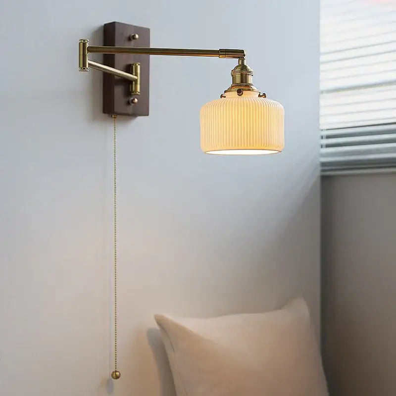 Brass Adjustable Wall Sconce with Ribbed Glass