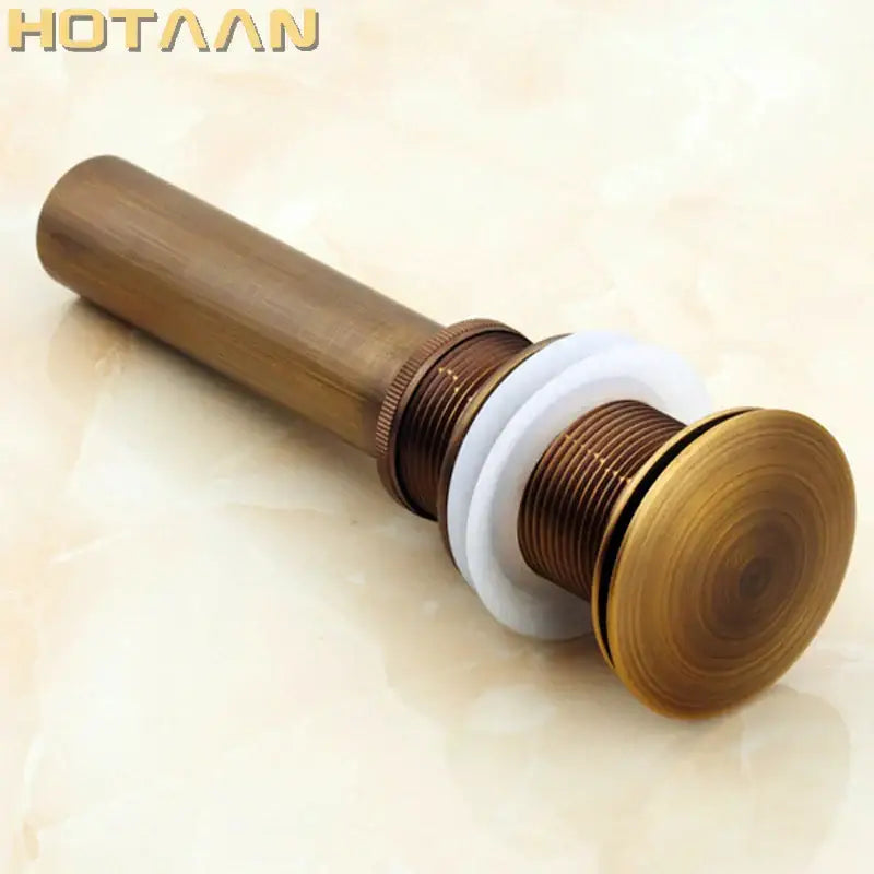 Antique Brass Sink Drain with White Rubber Seal