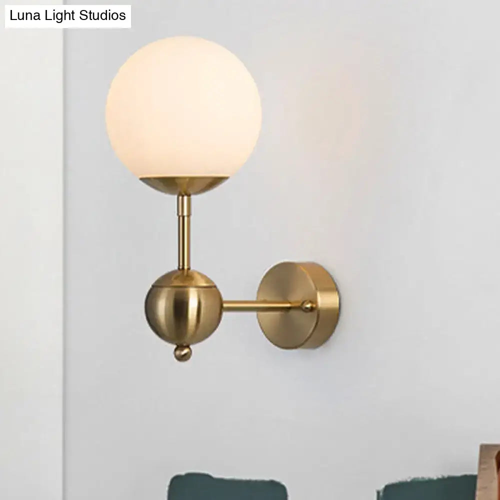 Brass Globe Bathroom Sconce