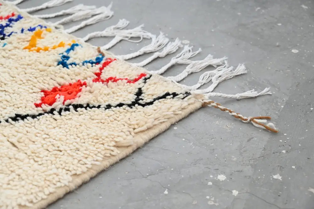 Beige Azilal Moroccan Rug with Vibrant Patterns