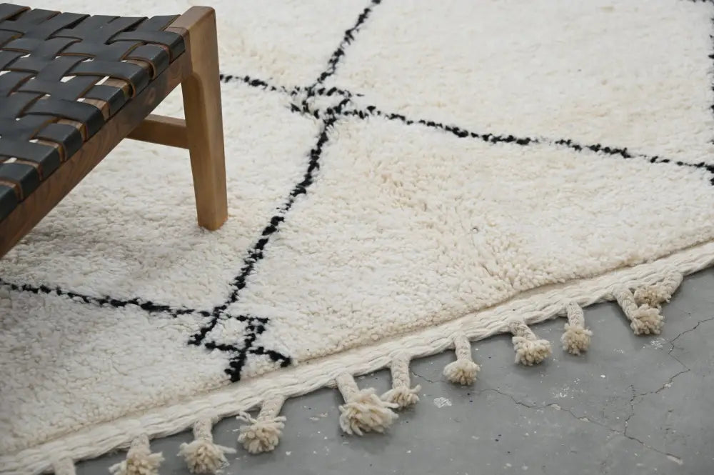 Traditional Cream Black Moroccan Rug for Contemporary Spaces