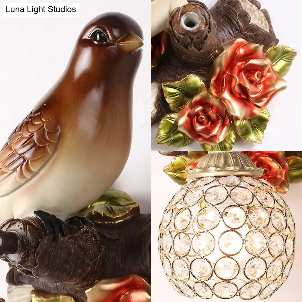 Brown Bird Wall Sconce Crystal Globe Shade