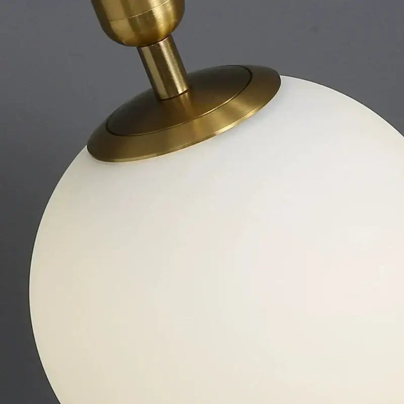 Brass Glass Wall Sconce with Frosted Shade