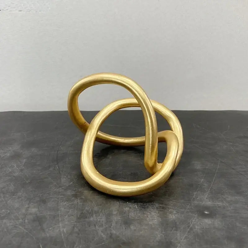 Gold Ring Knot Sculpture