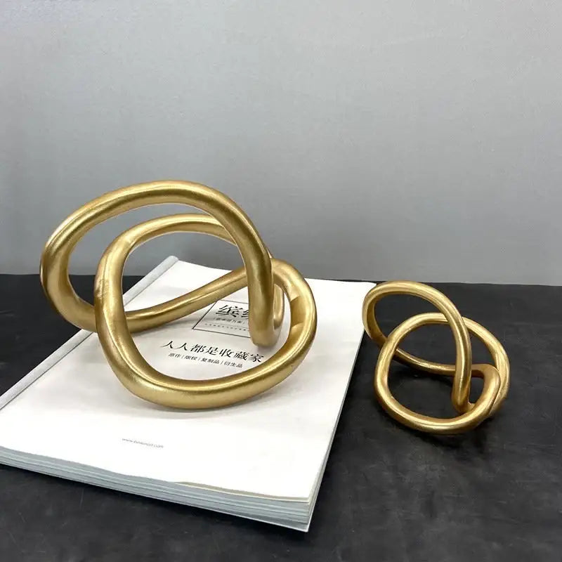 Gold Ring Knot Sculpture