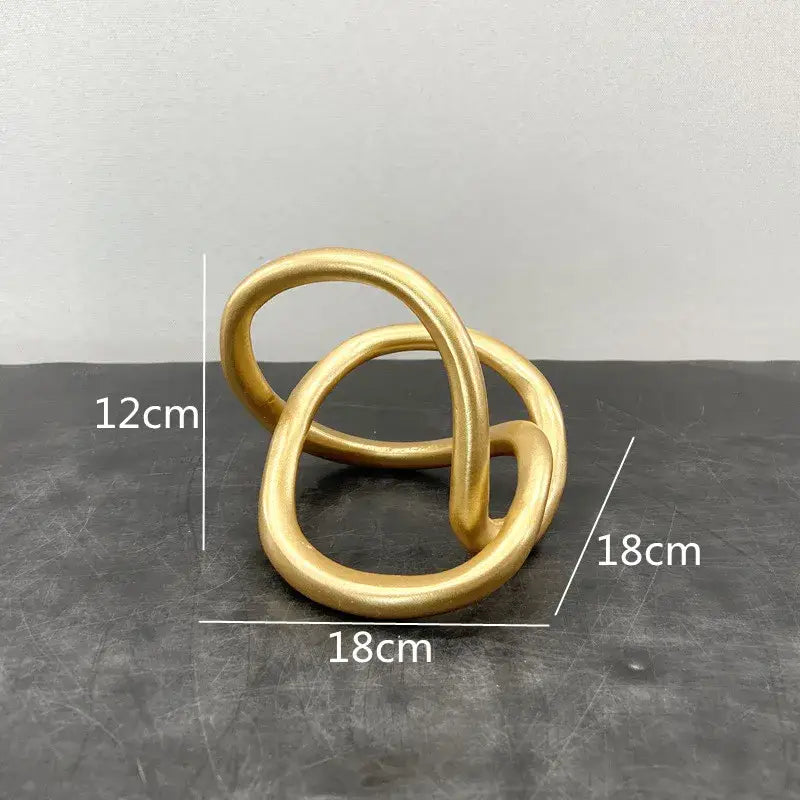 Gold Ring Knot Sculpture