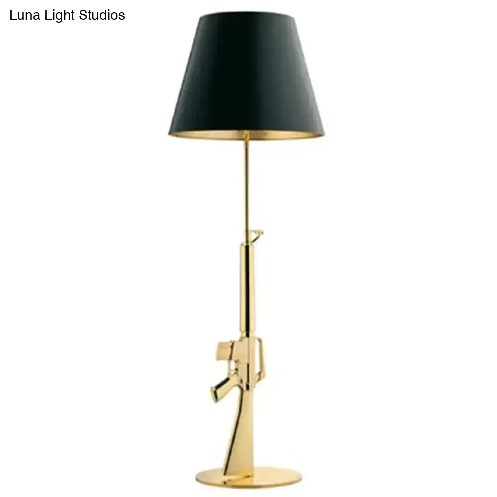 Gold Black Gun Floor Lamp