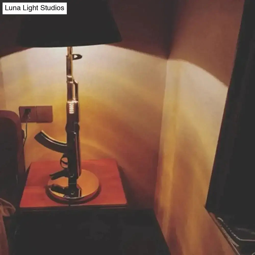 Gold Black Gun Floor Lamp