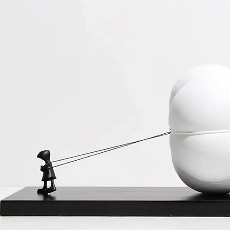 Black Balloon Man Sculpture