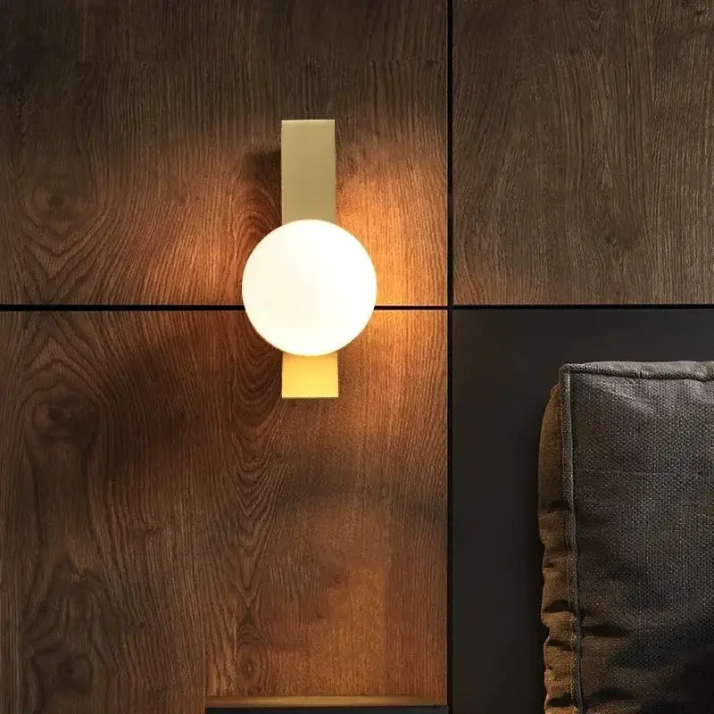 Gold Minimalist Wall Sconce with Clean Lines