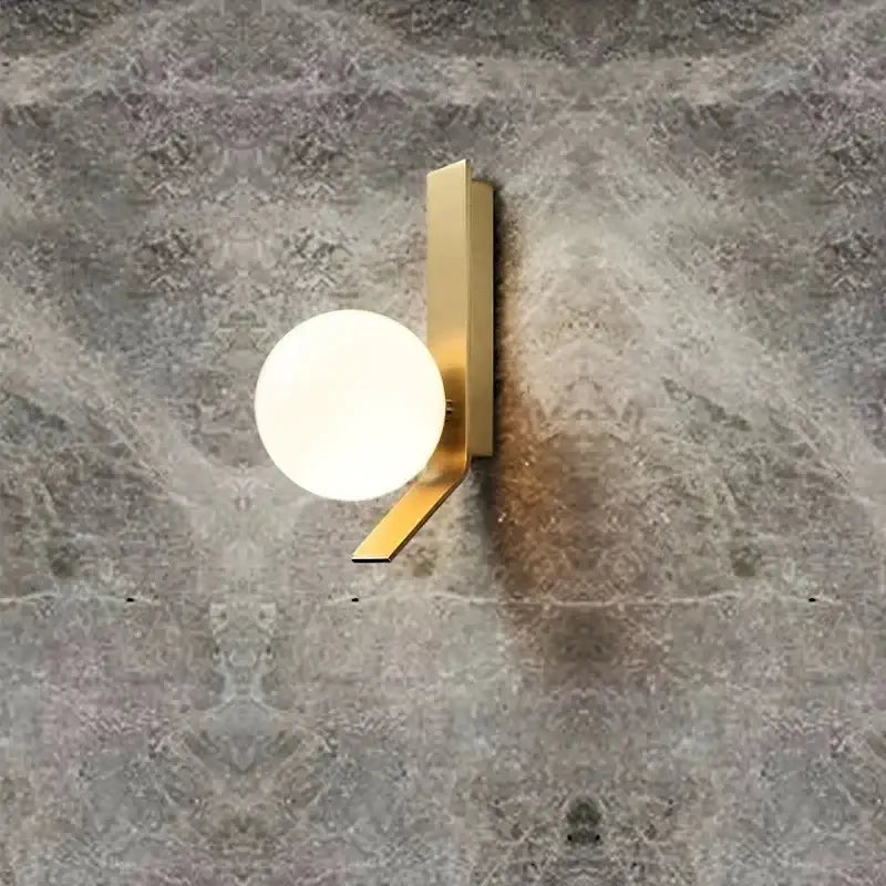 Gold Minimalist Wall Sconce with Clean Lines