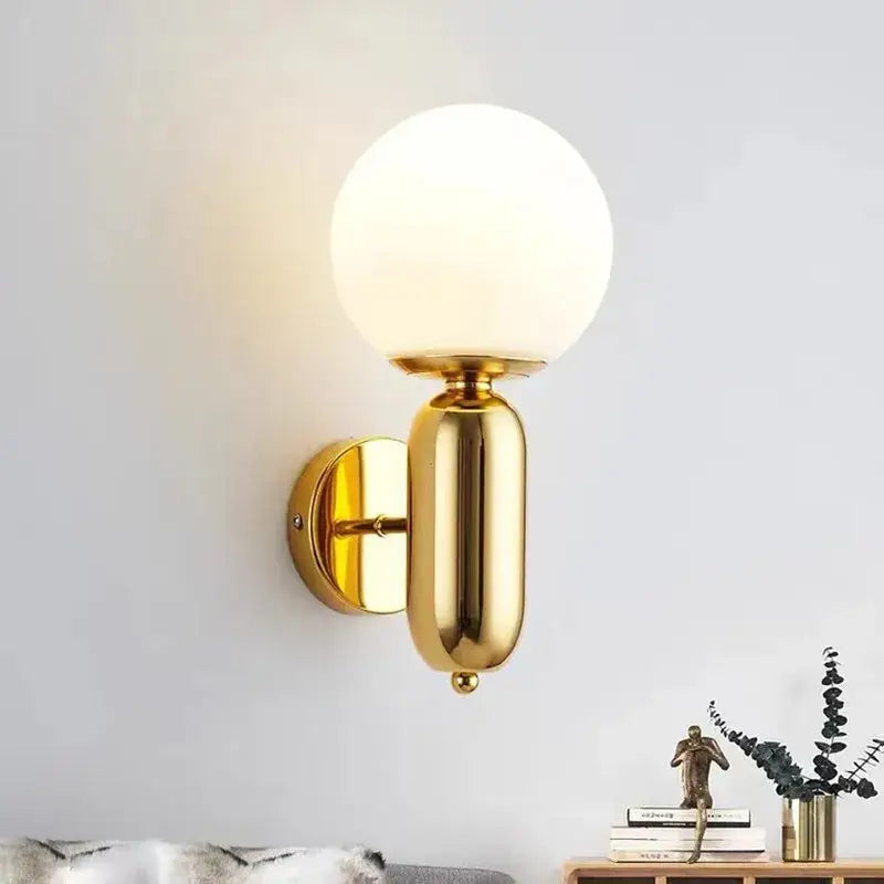 Gold Mirror Ball Sconce