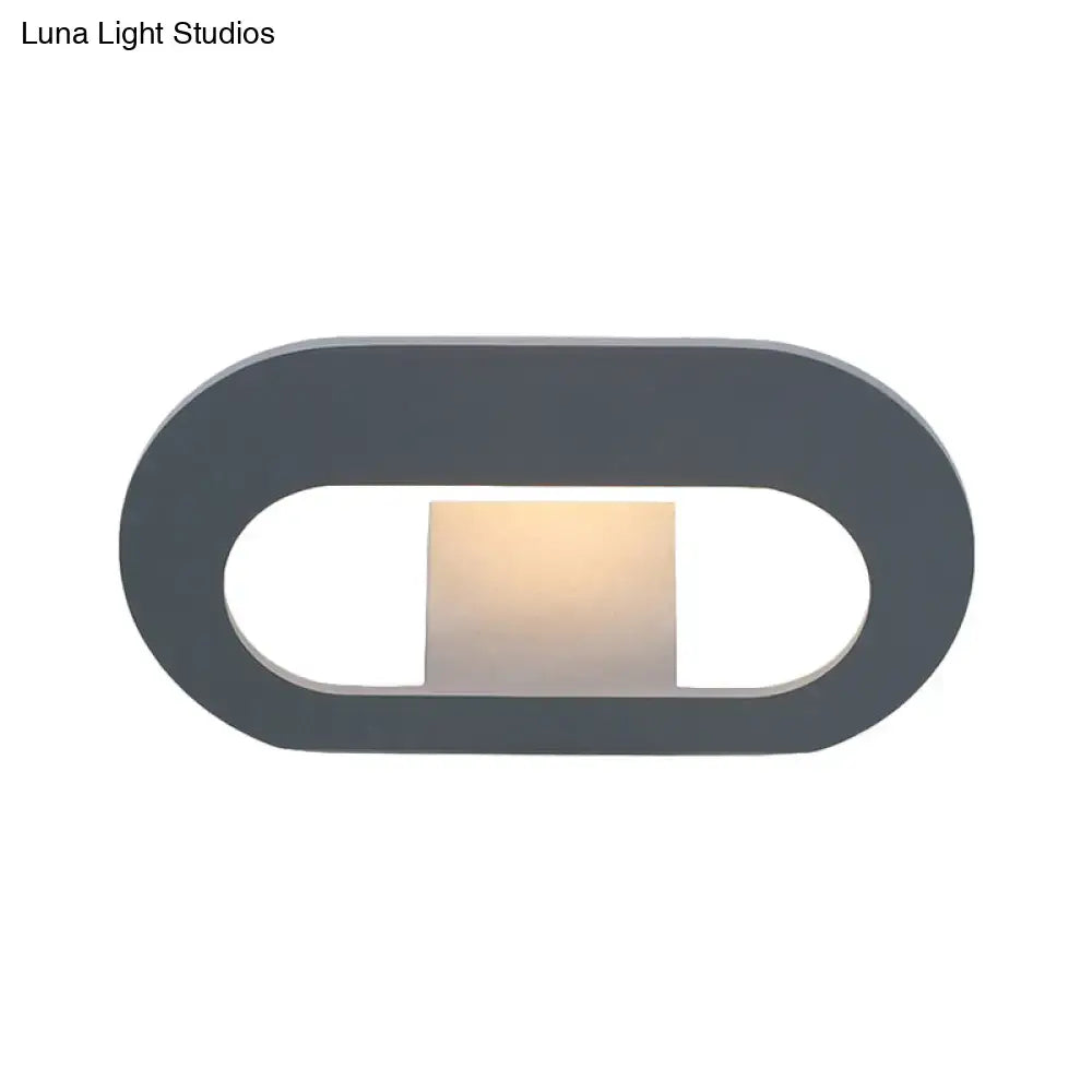 Black Oval Metal Reading-Nook Wall Lamp