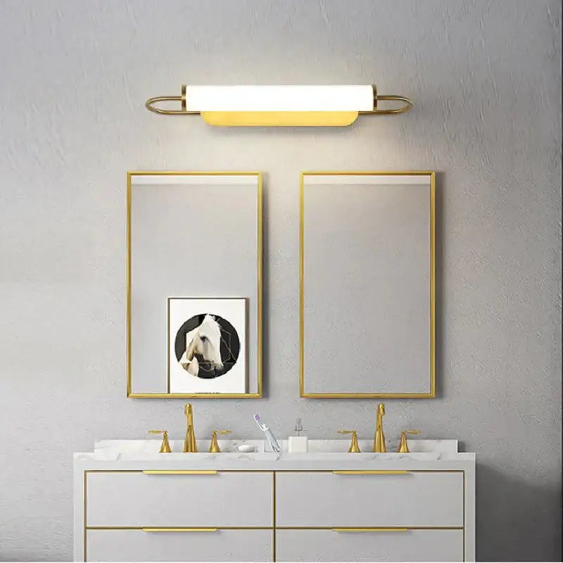 Gold Cylindrical Up-Down Bedroom Sconce