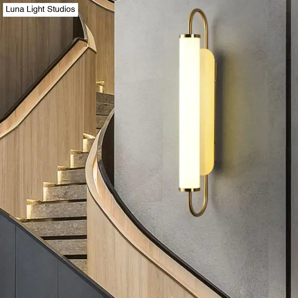 Gold Cylindrical Up-Down Bedroom Sconce