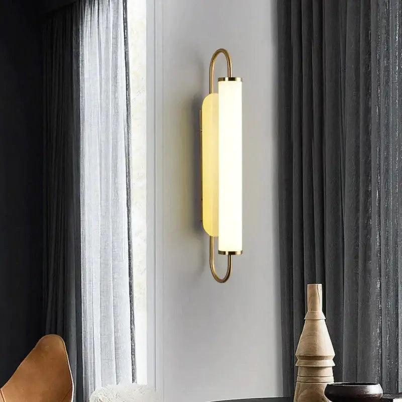 Gold Cylindrical Up-Down Bedroom Sconce