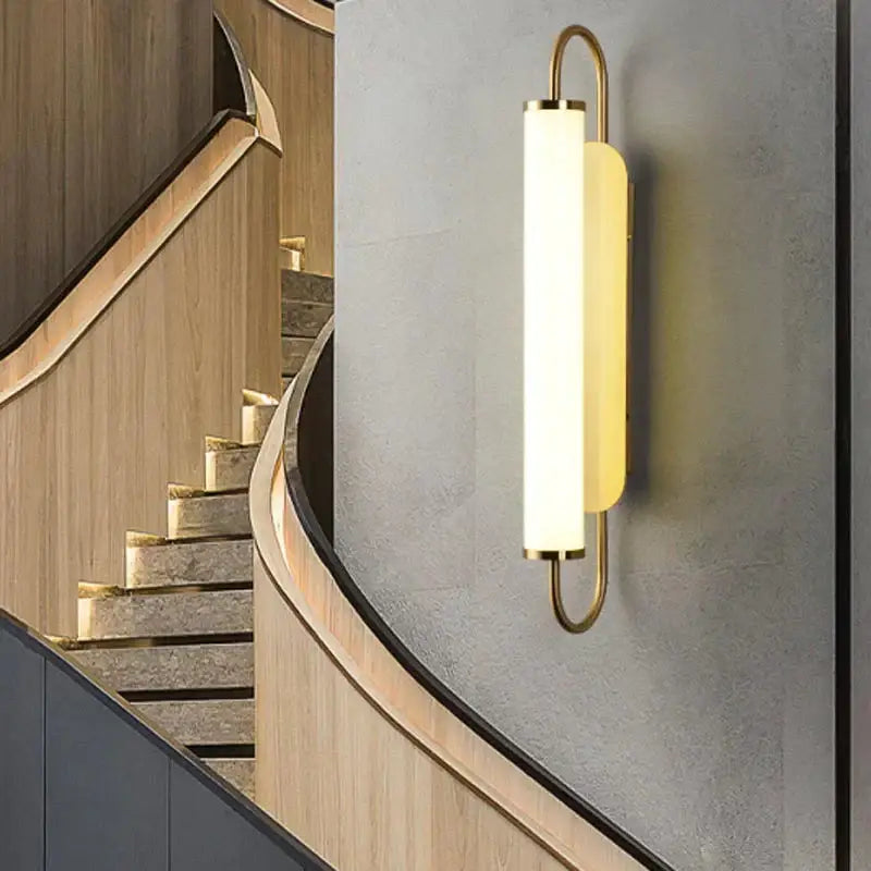 Gold Cylindrical Up-Down Bedroom Sconce