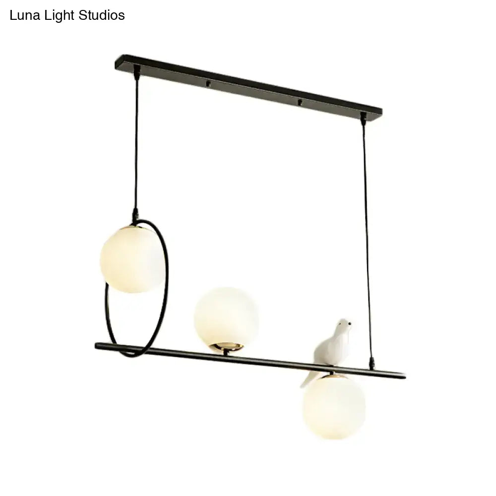 Black Milk Glass Bird Three-Light Pendant