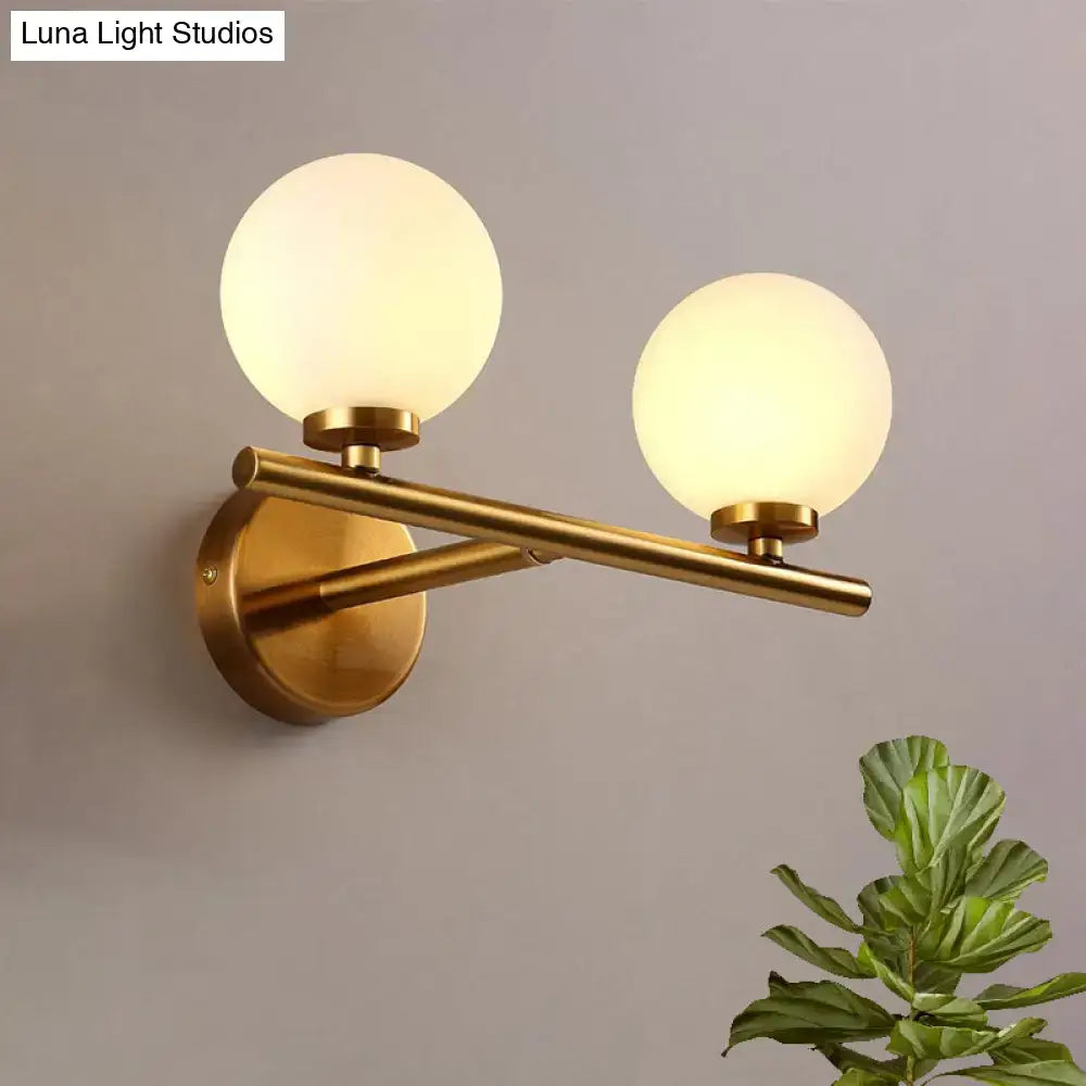 Brass Globe Compact Wall Sconce