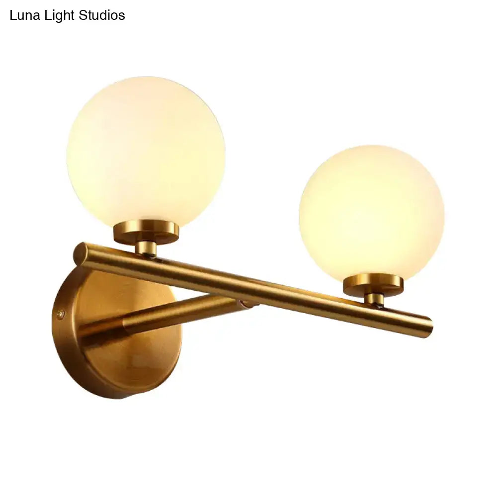 Brass Globe Compact Wall Sconce
