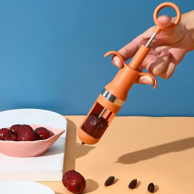 Orange Metal Cherry Pitter