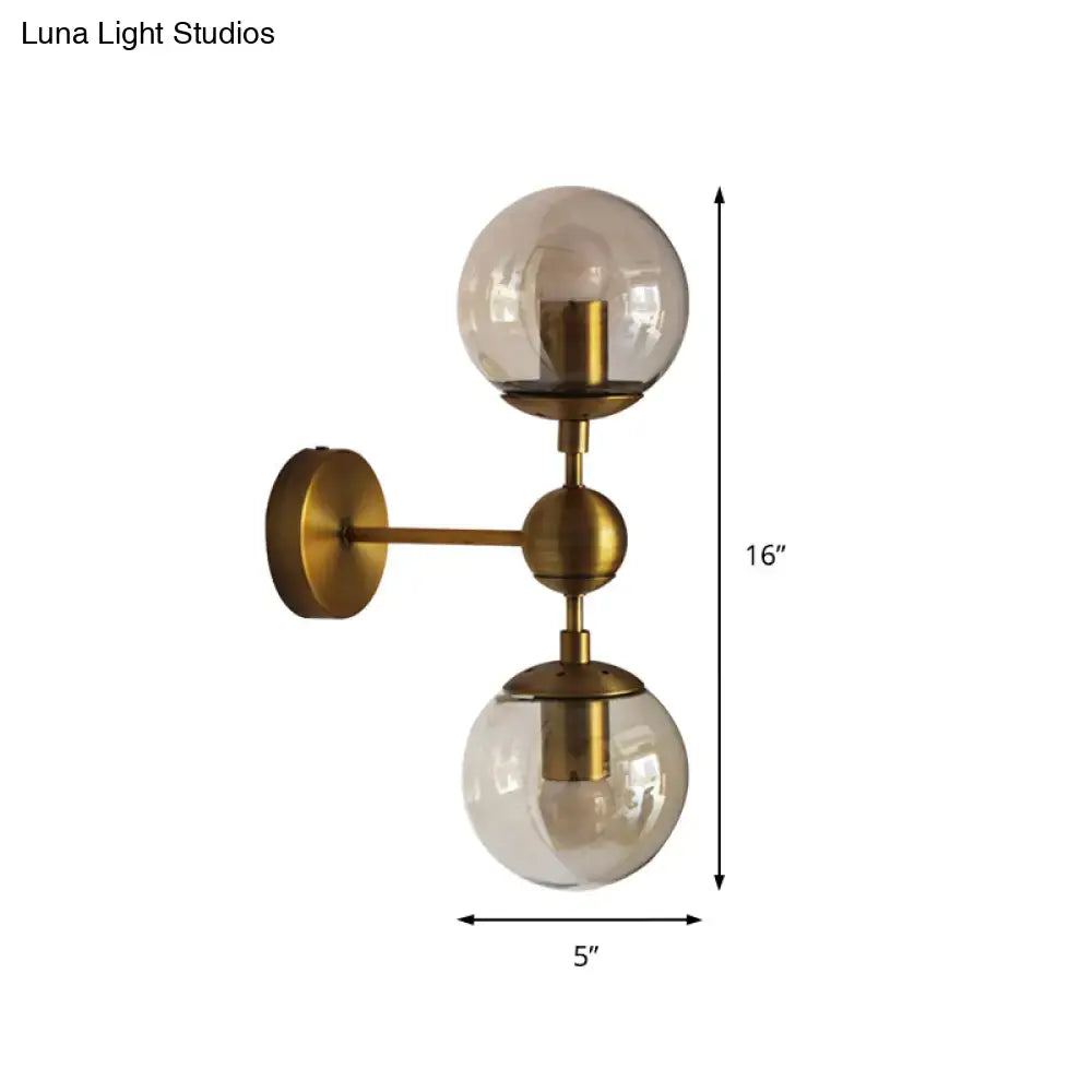 Brass Amber Globe Sconce