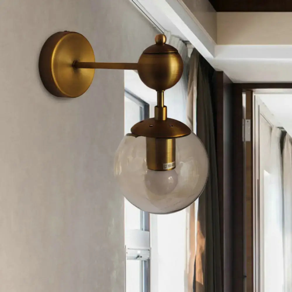 Brass Amber Globe Sconce
