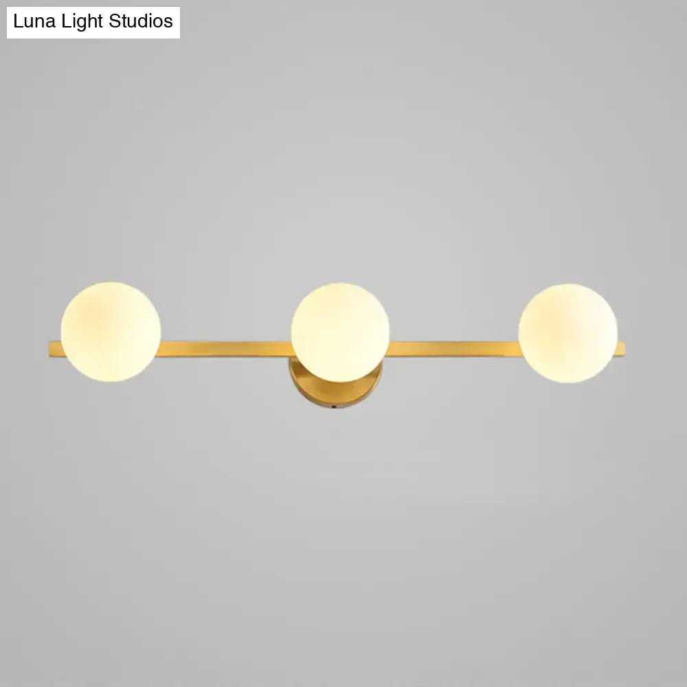 Gold Glass Globe Vanity Light