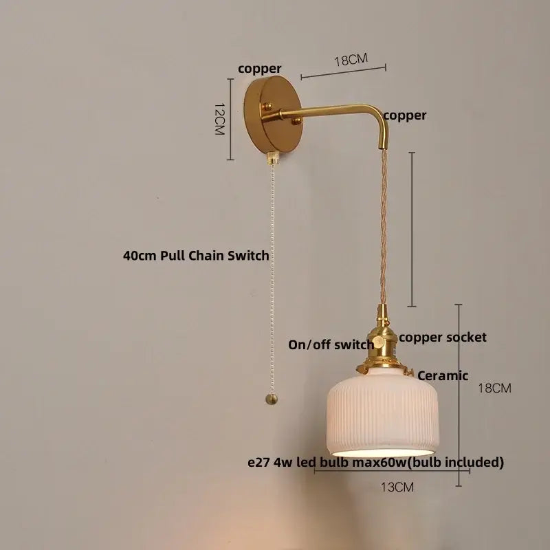 Vintage brass wall light with ribbed glass and knob switch bedroom