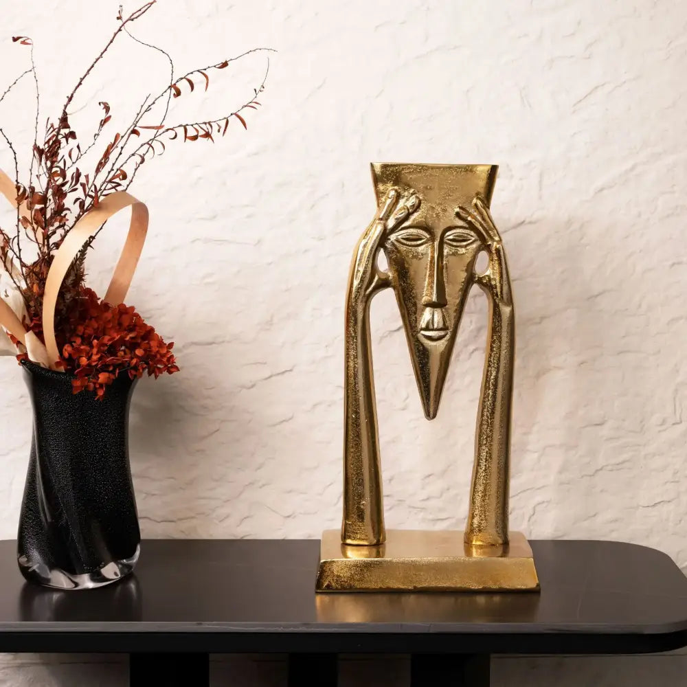 Gold Masked Figure Sculpture