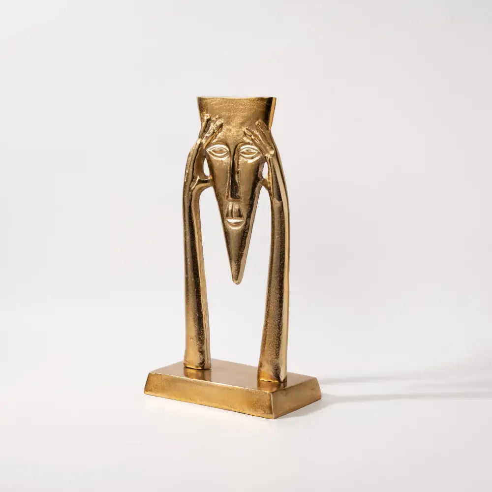 Gold Masked Figure Sculpture