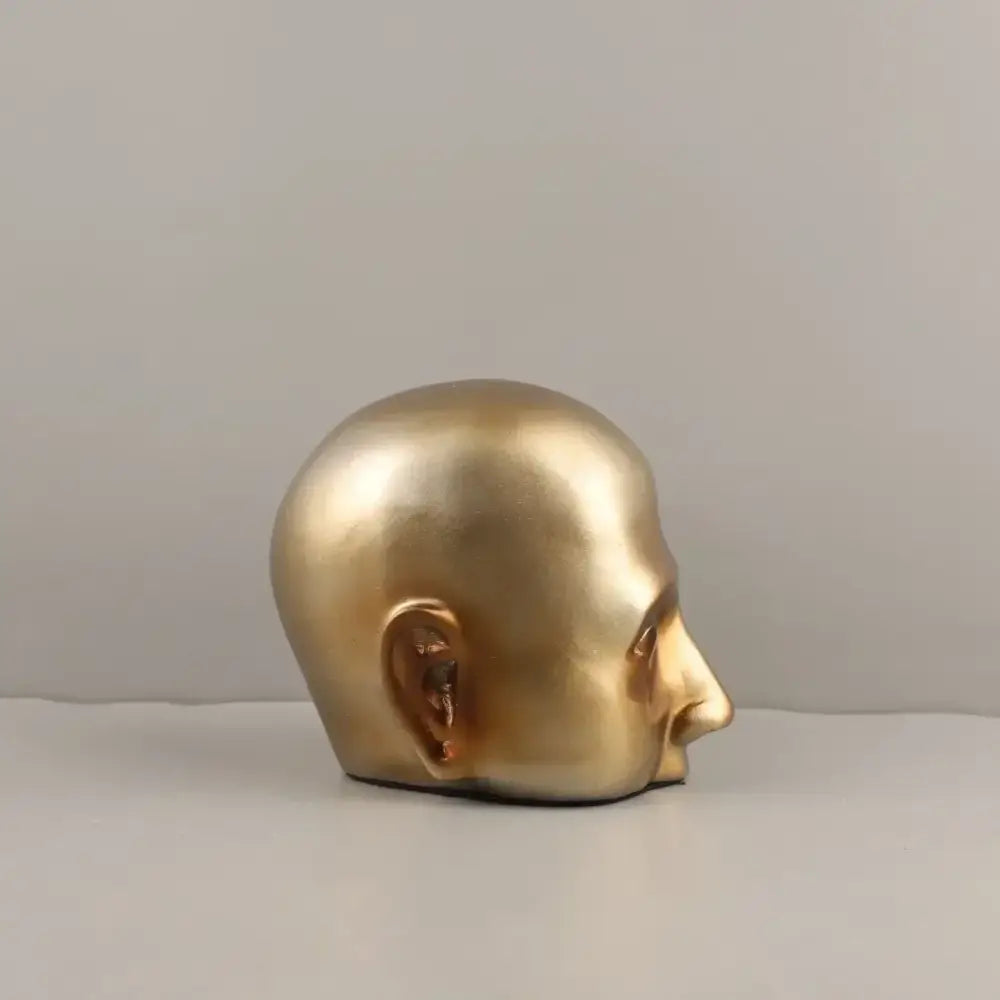 Gold Abstract Face Sculpture