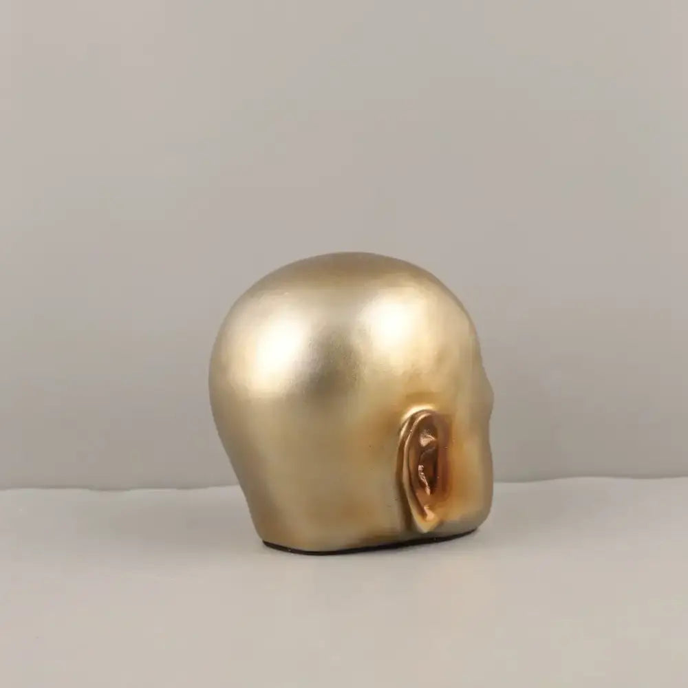 Gold Abstract Face Sculpture