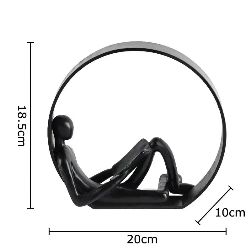 Black Resin Reading Figurine