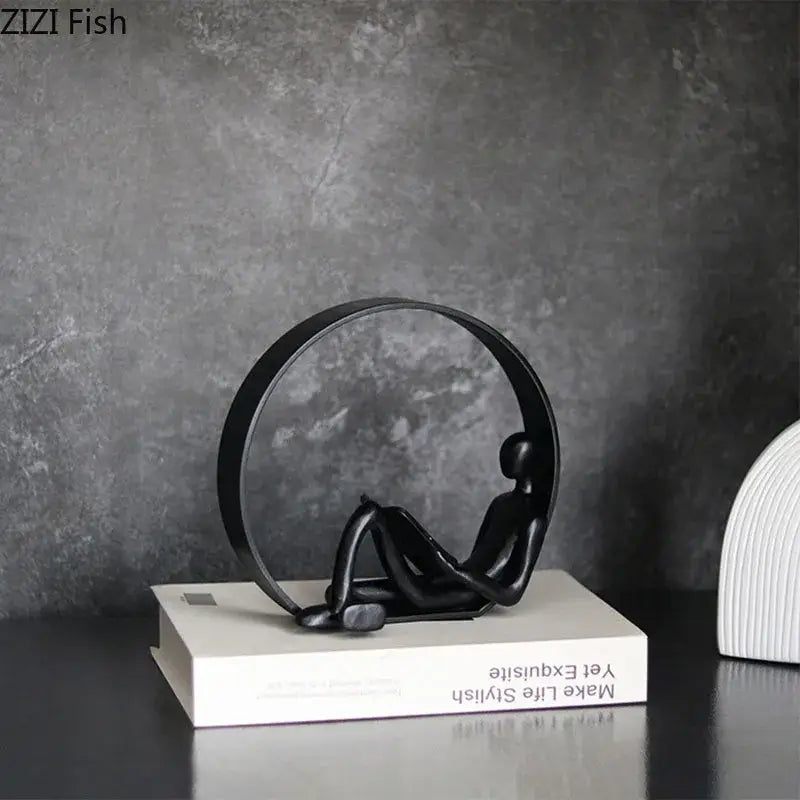 Black Resin Reading Figurine