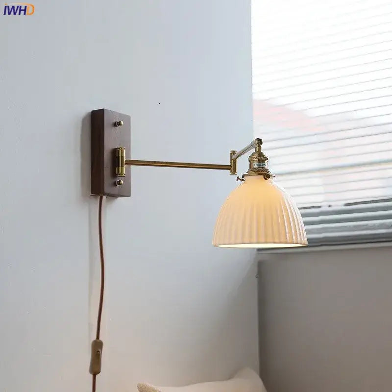 Brass Adjustable Wall Sconce with Ribbed Glass