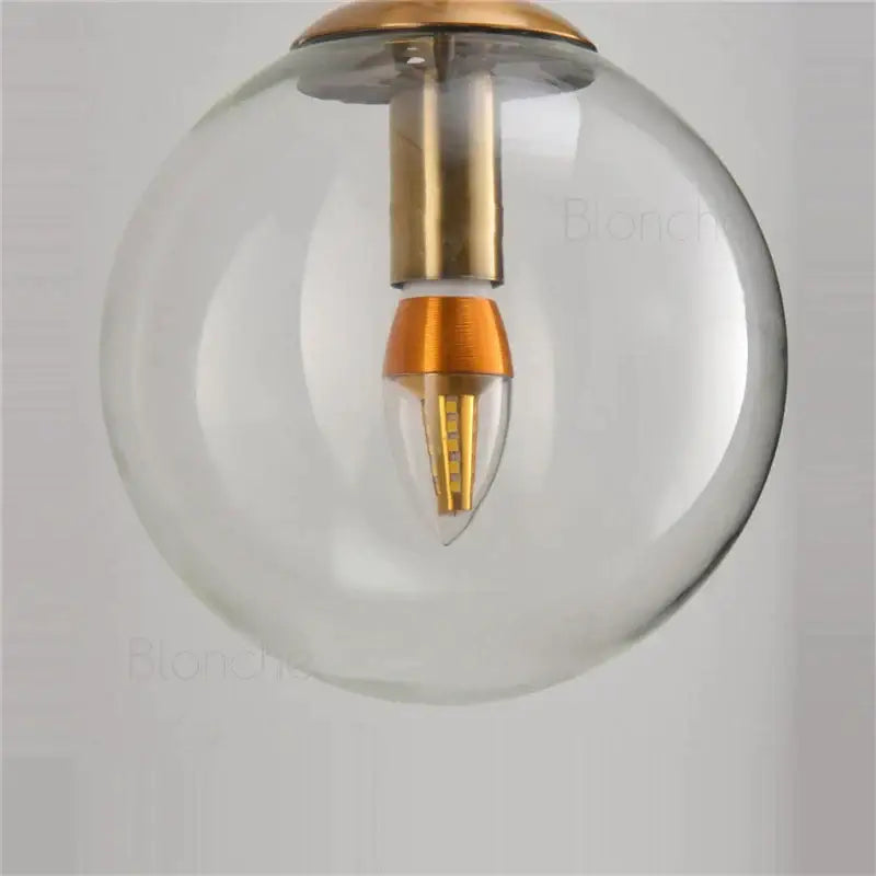 Amber Glass Wall Light Brass
