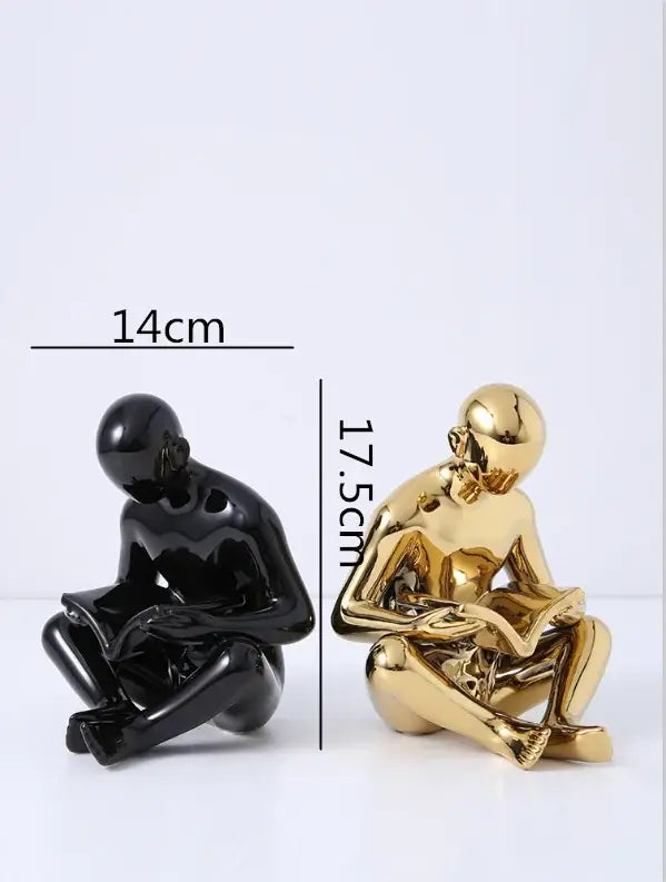 Black Ceramic Reading Figurine