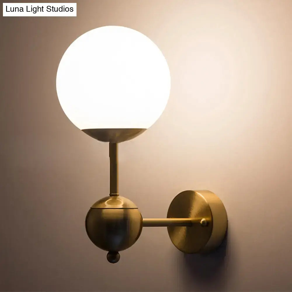 Brass Globe Bathroom Sconce