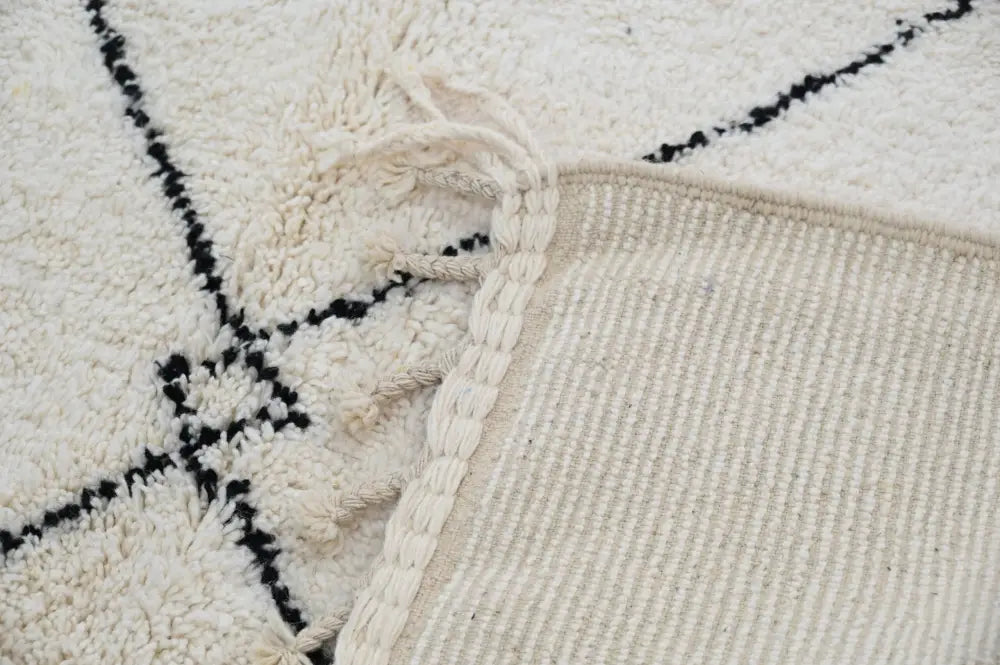 Traditional Cream Black Moroccan Rug for Contemporary Spaces