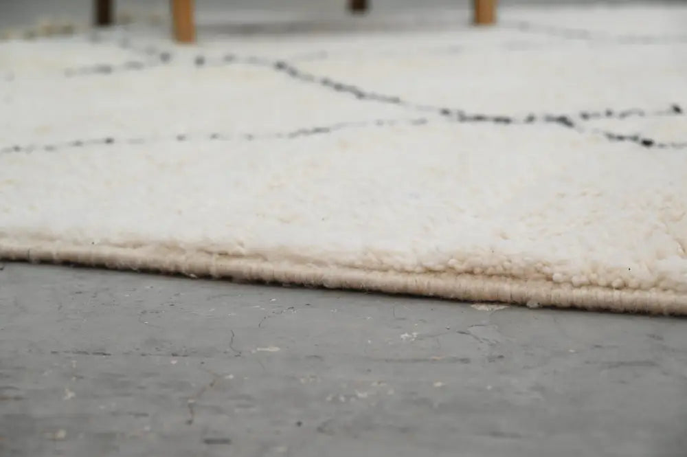 Traditional Cream Black Moroccan Rug for Contemporary Spaces