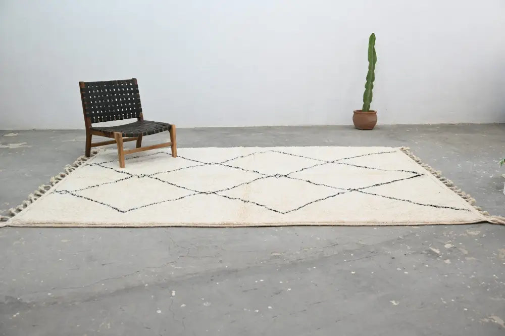 Traditional Cream Black Moroccan Rug for Contemporary Spaces