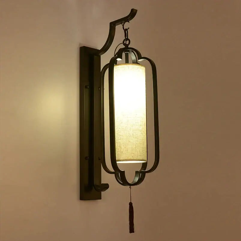 Black Iron Wall Sconce With Tassel Detail