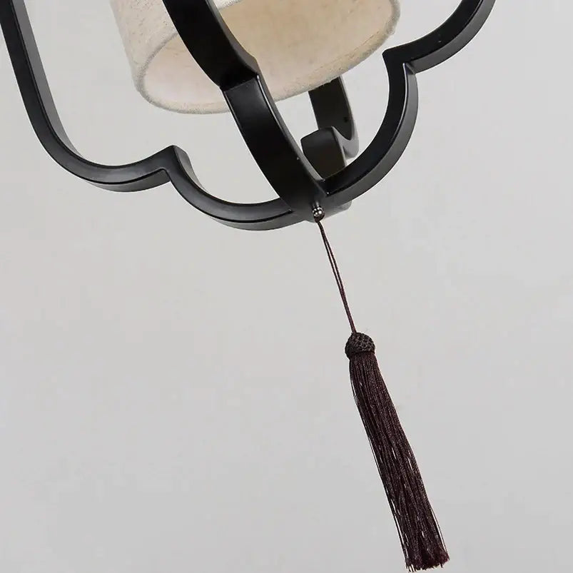 Black Iron Wall Sconce With Tassel Detail