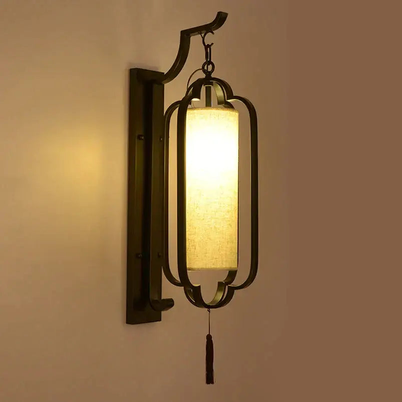 Black Iron Wall Sconce With Tassel Detail