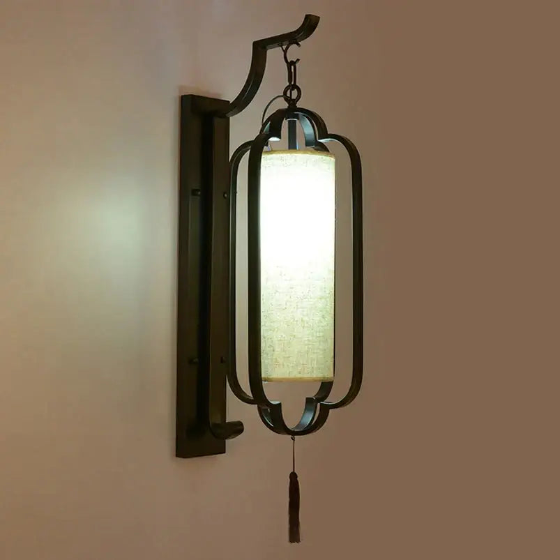 Black Iron Wall Sconce With Tassel Detail