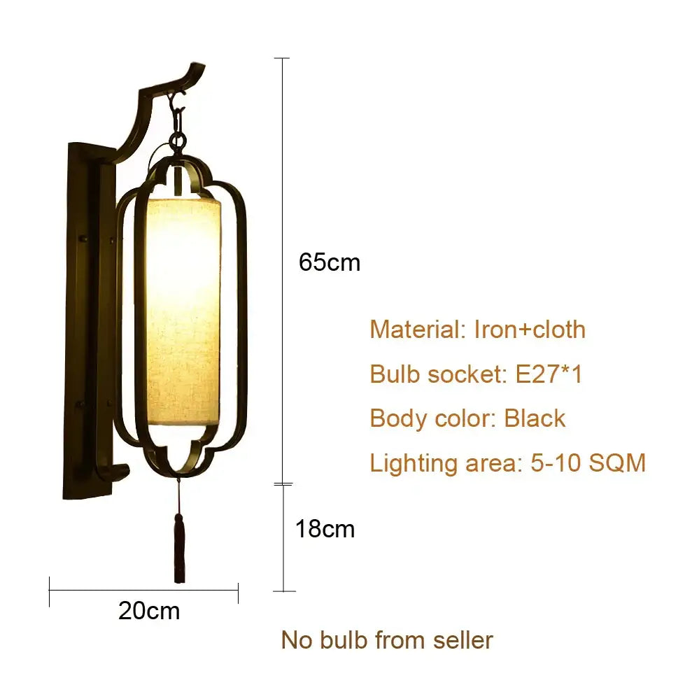 Black Iron Wall Sconce With Tassel Detail