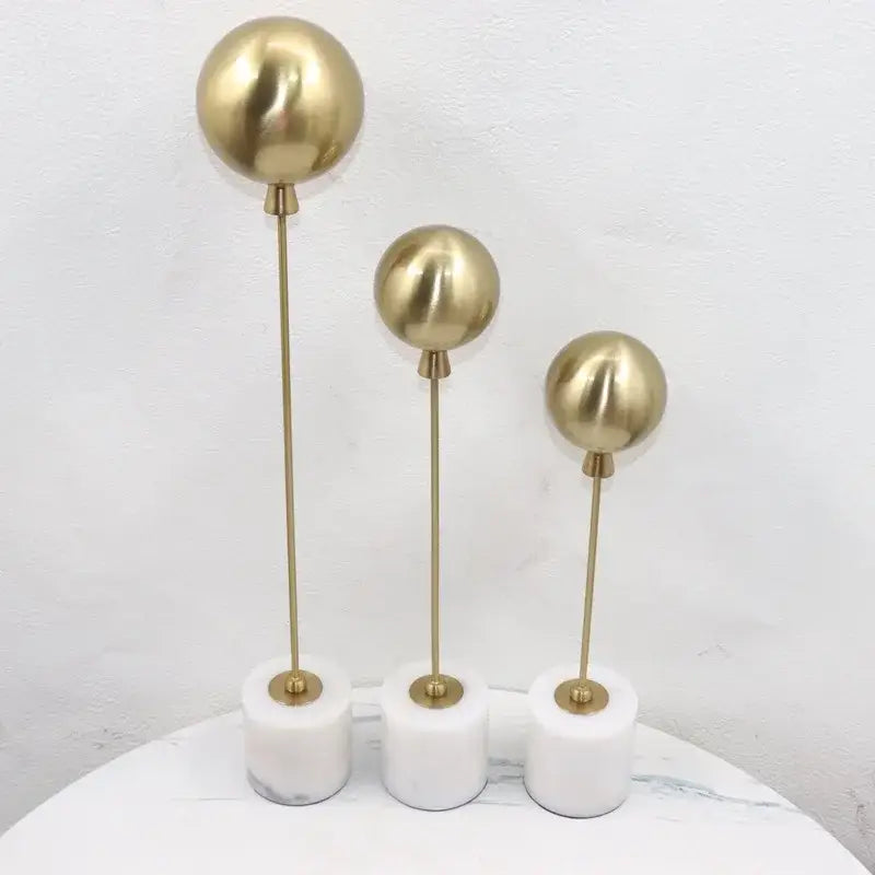 Gold Geometric Ball Sculptures